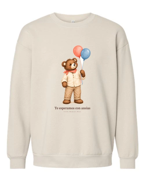 Sudadera Cream con el estampado «Te esperamos con ansias»: un osito sostiene dos globos, uno rosa y uno azul.
